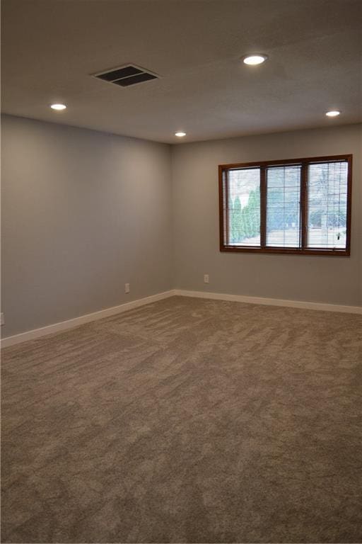 660 Elmdale, Chillicothe, MO 64601 - carpeted spare room featuring visible vents, recessed lighting, and baseboards
