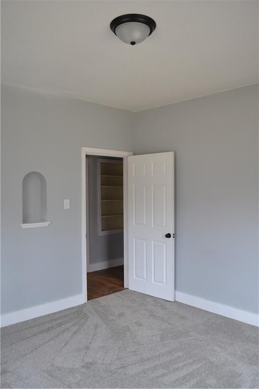 660 Elmdale, Chillicothe, MO 64601 - spare room with baseboards and carpet floors