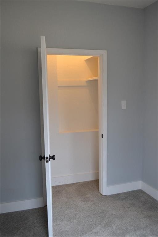 660 Elmdale, Chillicothe, MO 64601 - unfurnished bedroom featuring baseboards and carpet flooring