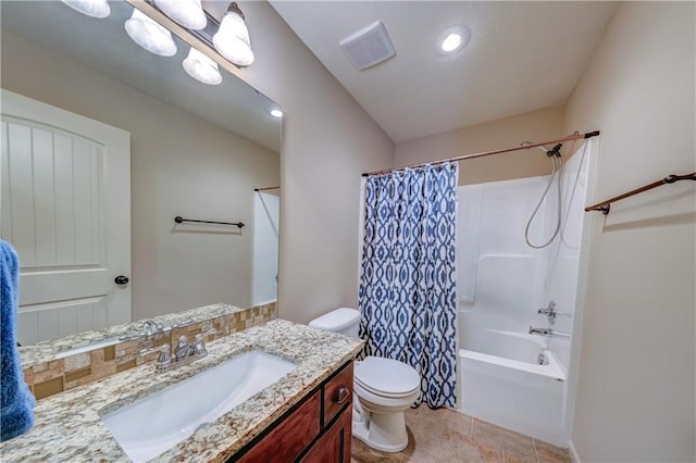 full bathroom featuring toilet, vanity, and shower / bath combo