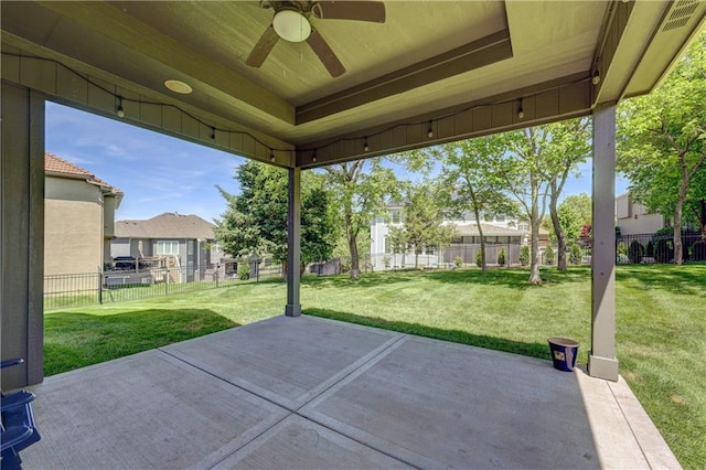 view of patio with ceiling fan and a residential view
