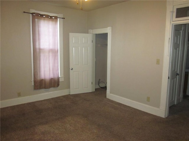 1202 N 8th St, Saint Joseph, MO 64501 - carpeted spare room with baseboards