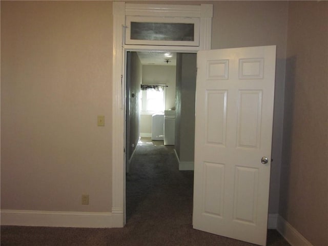 1202 N 8th St, Saint Joseph, MO 64501 - corridor featuring dark colored carpet and baseboards