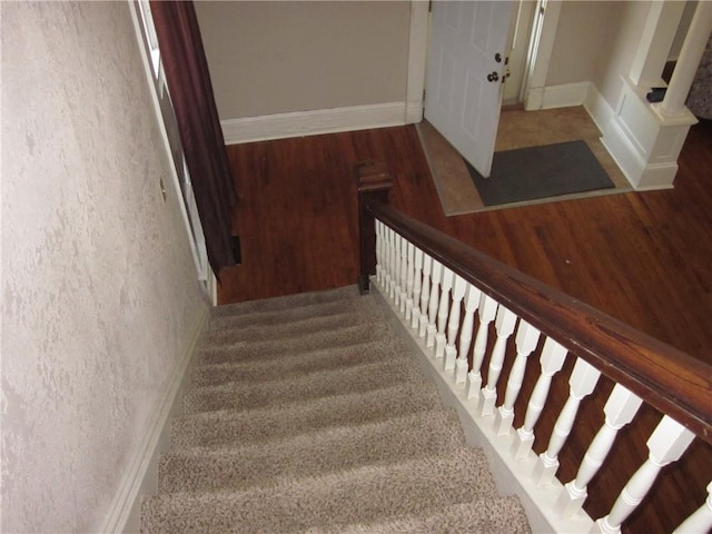 1202 N 8th St, Saint Joseph, MO 64501 - stairs with wood finished floors