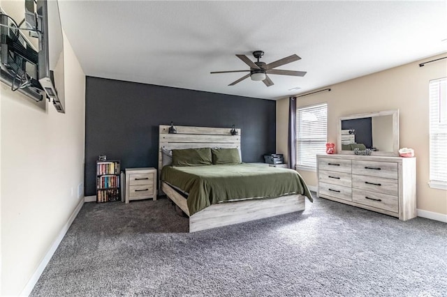 bedroom featuring baseboards, carpet floors, and ceiling fan