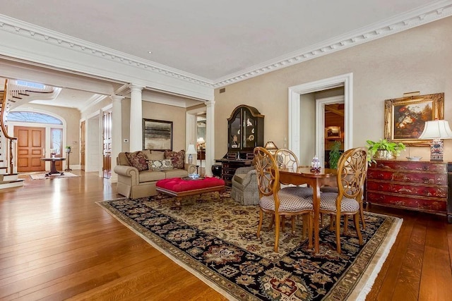 17960 S Bond St, Bucyrus, KS 66013 - sitting room with wood-type flooring, stairway, crown molding, and decorative columns