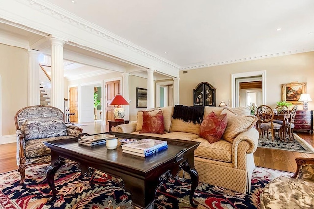 17960 S Bond St, Bucyrus, KS 66013 - living room with ornate columns, hardwood / wood-style floors, and crown molding