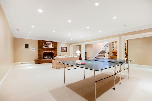 17960 S Bond St, Bucyrus, KS 66013 - recreation room featuring recessed lighting, a brick fireplace, ornamental molding, and carpet floors