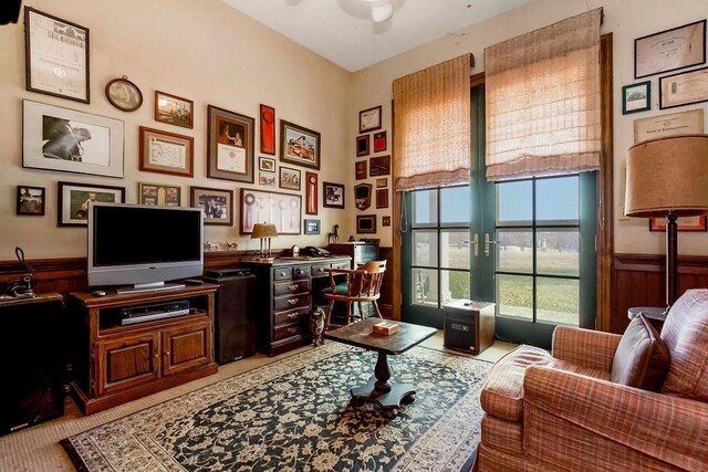 17960 S Bond St, Bucyrus, KS 66013 - home office featuring french doors, a ceiling fan, and a wainscoted wall