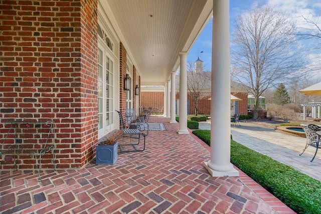17960 S Bond St, Bucyrus, KS 66013 - view of patio with french doors and a jacuzzi