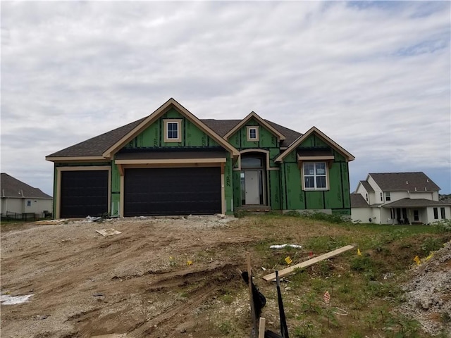 4275 Lake Shore Ct, Basehor, KS 66007 - property in mid-construction featuring a garage and driveway