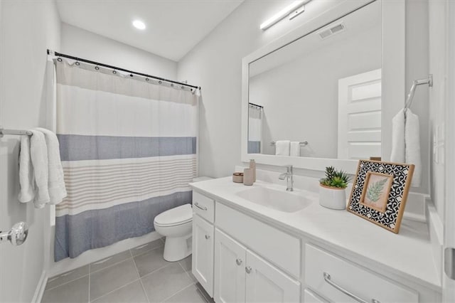 4275 Lake Shore Ct, Basehor, KS 66007 - bathroom featuring vanity, toilet, tile patterned floors, curtained shower, and recessed lighting