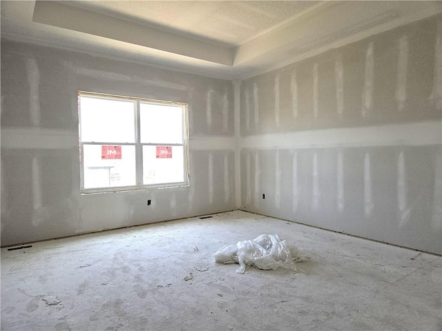4275 Lake Shore Ct, Basehor, KS 66007 - unfurnished room with a tray ceiling
