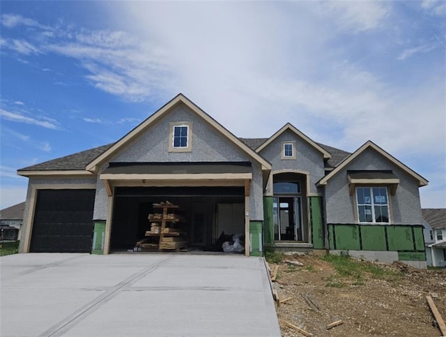 4275 Lake Shore Ct, Basehor, KS 66007 - property in mid-construction featuring concrete driveway, a garage, and stucco siding