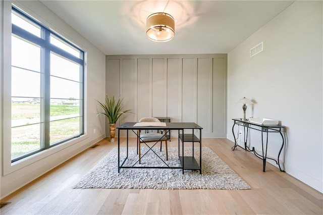 907 Reed Dr, Raymore, MO 64083 - office area with light wood-style flooring