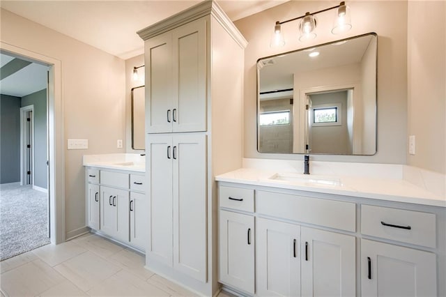 907 Reed Dr, Raymore, MO 64083 - bathroom with vanity