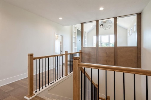 17041 Earnshaw St, Overland Park, KS 66221 - corridor with an upstairs landing, recessed lighting, and wood finished floors