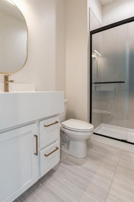 17041 Earnshaw St, Overland Park, KS 66221 - bathroom featuring vanity and a stall shower