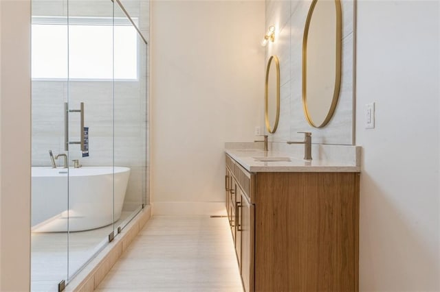 17041 Earnshaw St, Overland Park, KS 66221 - full bath with double vanity, a freestanding tub, and a shower stall