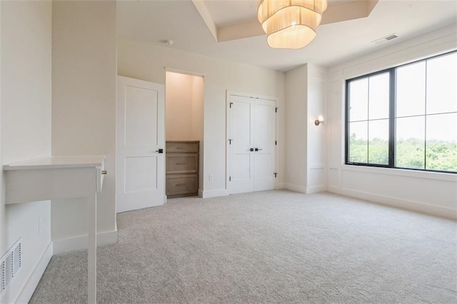 17041 Earnshaw St, Overland Park, KS 66221 - unfurnished bedroom with light colored carpet and baseboards