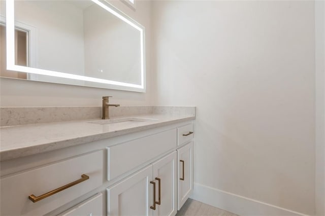 17041 Earnshaw St, Overland Park, KS 66221 - bathroom with vanity and baseboards