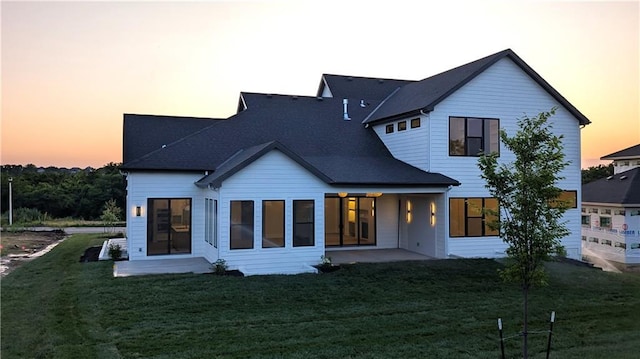 17041 Earnshaw St, Overland Park, KS 66221 - rear view of house with a patio area and a lawn