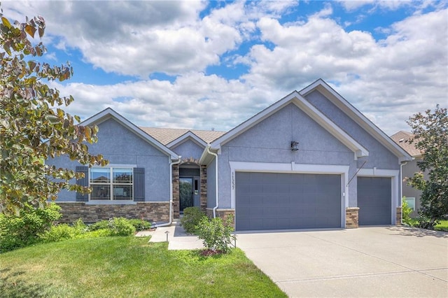 11237 S Race St, Olathe, KS 66061 - single story home with stucco siding, stone siding, concrete driveway, a garage, and a front lawn