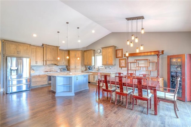 11237 S Race St, Olathe, KS 66061 - kitchen with stainless steel fridge, light countertops, dark wood-type flooring, tasteful backsplash, and open shelves