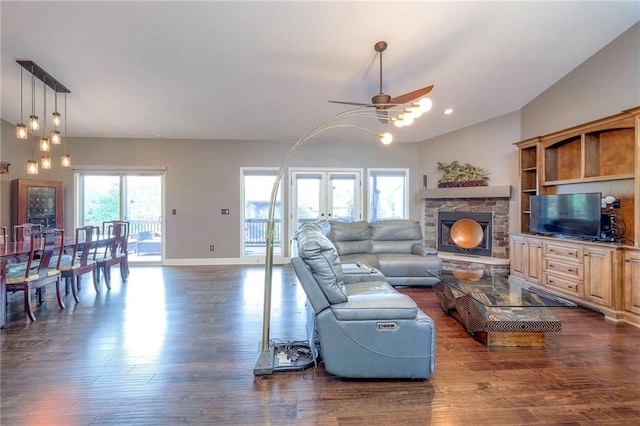 11237 S Race St, Olathe, KS 66061 - living room featuring ceiling fan, dark wood-style floors, vaulted ceiling, a fireplace, and recessed lighting