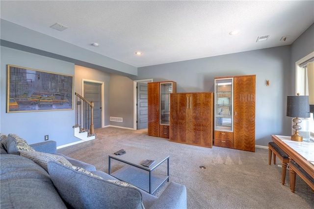 11237 S Race St, Olathe, KS 66061 - carpeted living room featuring stairs and recessed lighting
