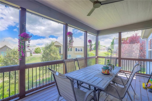 11237 S Race St, Olathe, KS 66061 - sunroom featuring ceiling fan, a residential view, and plenty of natural light