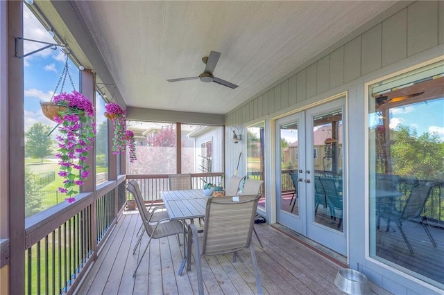 11237 S Race St, Olathe, KS 66061 - sunroom with french doors, ceiling fan, and outdoor dining space