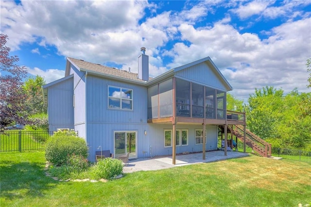 11237 S Race St, Olathe, KS 66061 - rear view of property with a sunroom, a chimney, stairs, and a patio