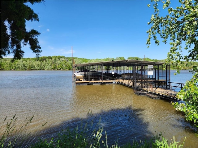 29243 Serene Ave, Warsaw, MO 65355 - dock area featuring a water view and boat lift