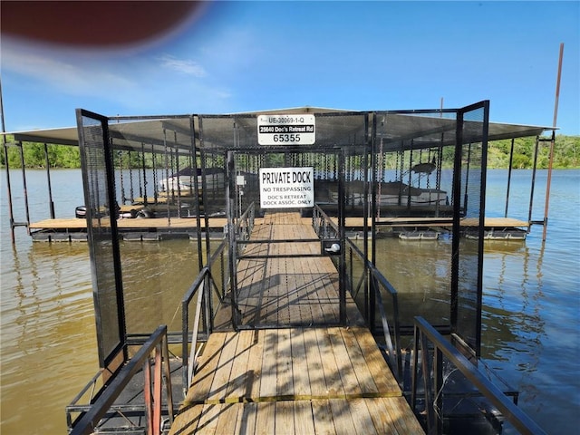 29243 Serene Ave, Warsaw, MO 65355 - dock area featuring a water view and boat lift