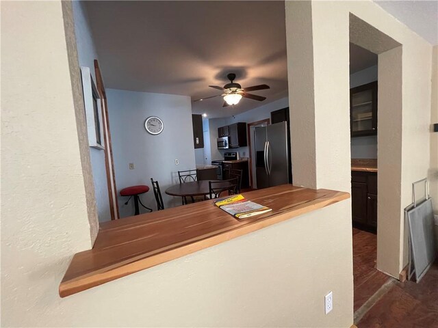 29243 Serene Ave, Warsaw, MO 65355 - kitchen featuring appliances with stainless steel finishes, ceiling fan, and dark wood-type flooring