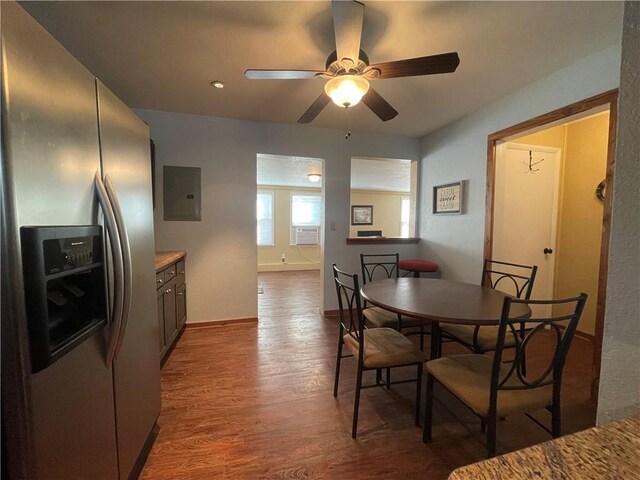 29243 Serene Ave, Warsaw, MO 65355 - dining space with electric panel, a ceiling fan, dark wood finished floors, baseboards, and cooling unit