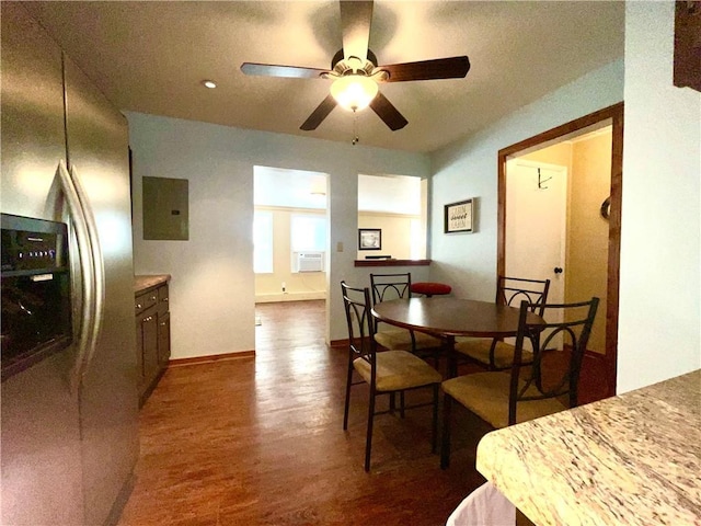 29243 Serene Ave, Warsaw, MO 65355 - dining room featuring ceiling fan, electric panel, dark wood-style flooring, cooling unit, and baseboards