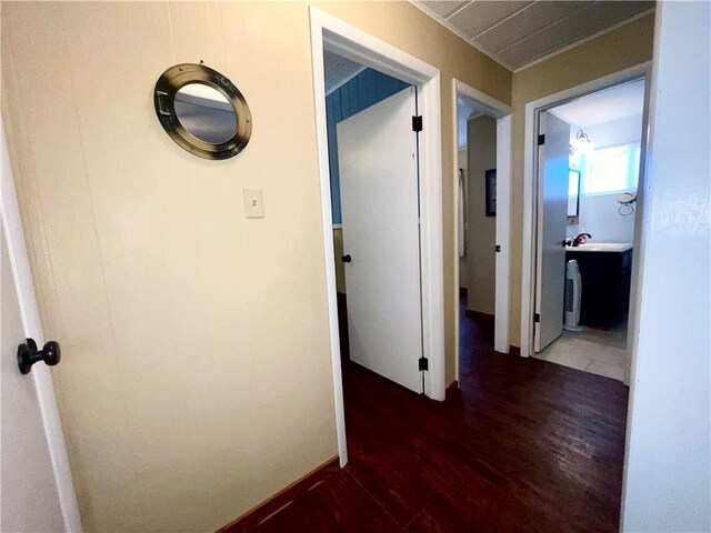 29243 Serene Ave, Warsaw, MO 65355 - hallway featuring wood finished floors, a sink, and baseboards