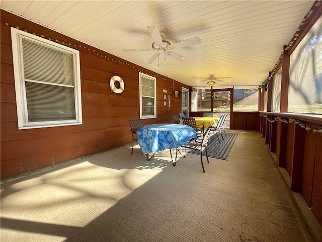 29243 Serene Ave, Warsaw, MO 65355 - sunroom / solarium with outdoor dining area and ceiling fan