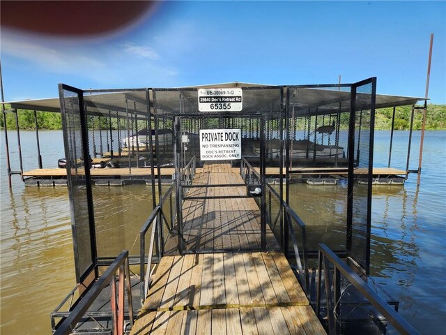 29243 Serene Ave, Warsaw, MO 65355 - dock featuring a water view and boat lift