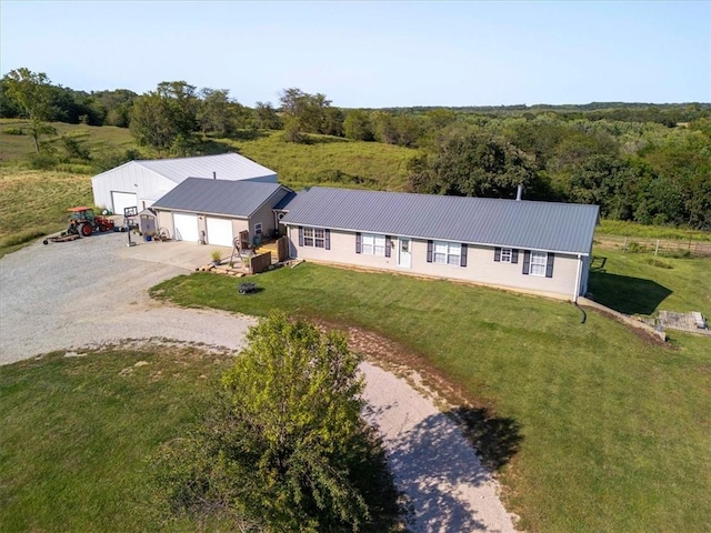 14199 County Road 191, Savannah, MO 64485 - birds eye view of property with a forest view