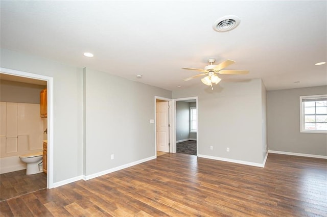 empty room with visible vents, baseboards, ceiling fan, recessed lighting, and wood finished floors