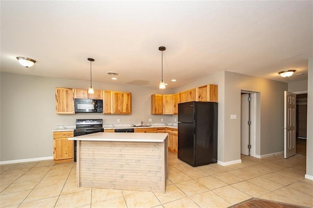 kitchen featuring light tile patterned floors, black appliances, light countertops, and a sink
