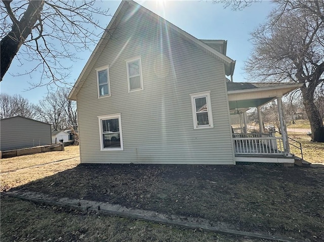 236 N Liberty St, Troy, KS 66087 - view of side of property with a porch