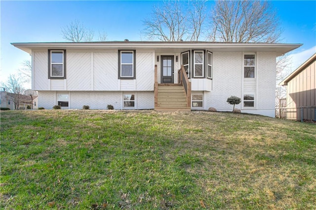 14401 67th St, Parkville, MO 64152 - view of front of property with a front lawn and brick siding