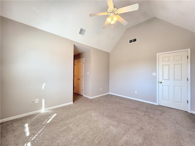 carpeted spare room with high vaulted ceiling, baseboards, visible vents, and ceiling fan
