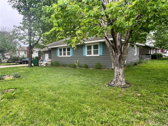 exterior space with a lawn