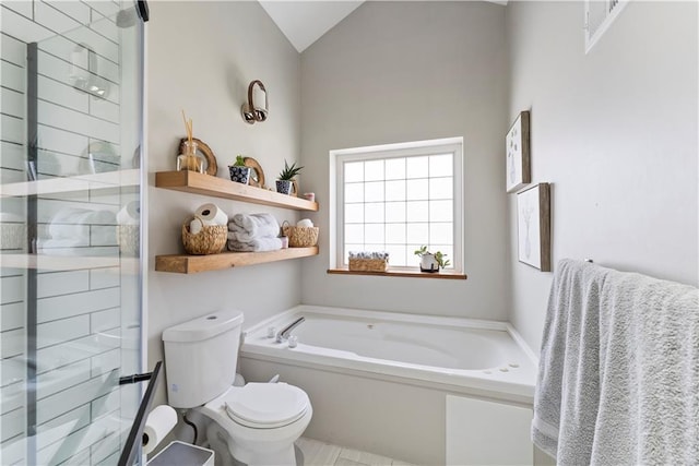full bathroom with a bath, vaulted ceiling, a tile shower, and toilet
