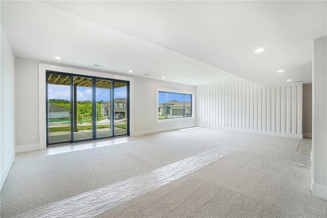 2317 SW Morris Dr, Lees Summit, MO 64082 - spare room with light colored carpet, recessed lighting, and baseboards